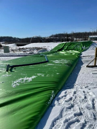 Fort McMurray uses water barrier coffer dams to prevent water flooding into the city, NCS Environmental Solutions tests these water barriers as an authorized and licensed quality agent of Ark Flood and Dam 